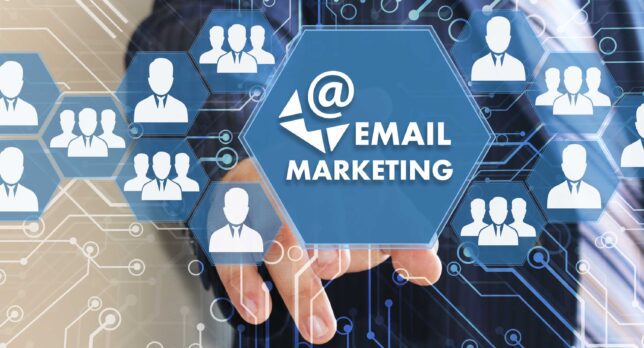 A hand touching a blue hexagon with the text "EMAIL MARKETING" is surrounded by silhouettes of people, indicating the target audience of email marketing platforms.